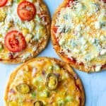 Greek, Mexican and classic veggie Pita Pizzas ready to eat
